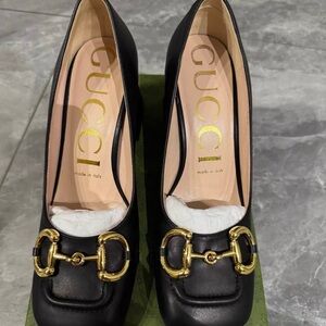 Gucci Women's Black Heels with Gold Accents